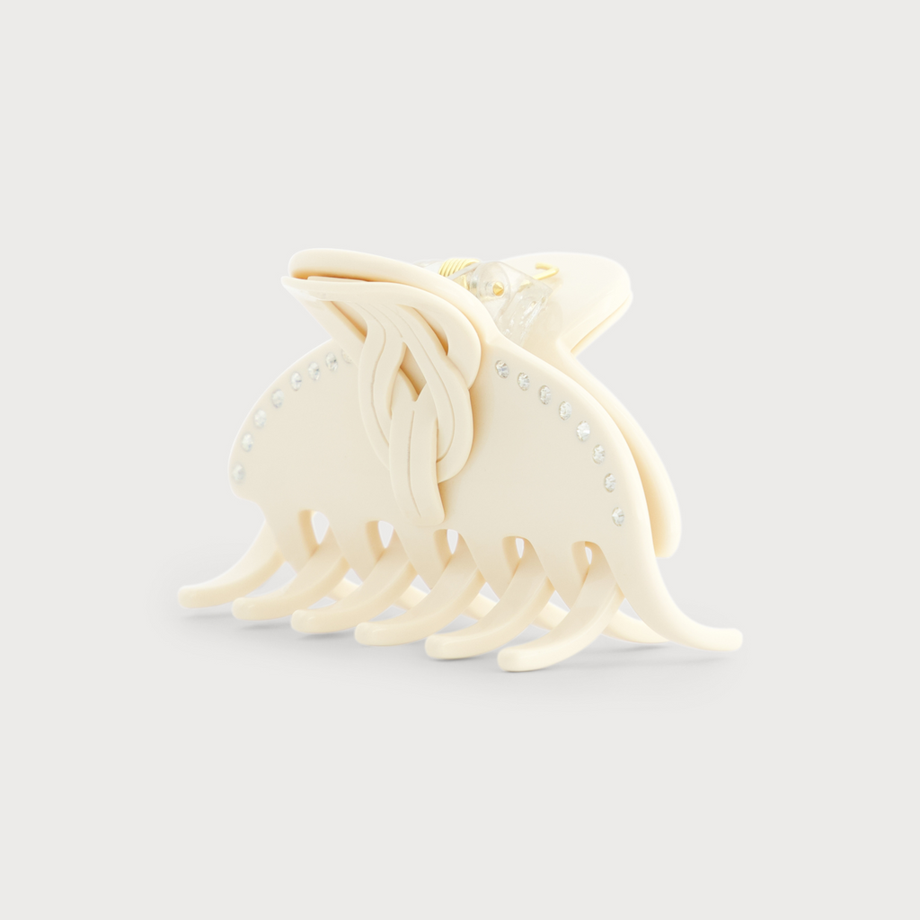 Pince S accessoire de cheveux confectionnée en France auprès d'artisans luxe finitions Knot vue de profil couleur Ivoire