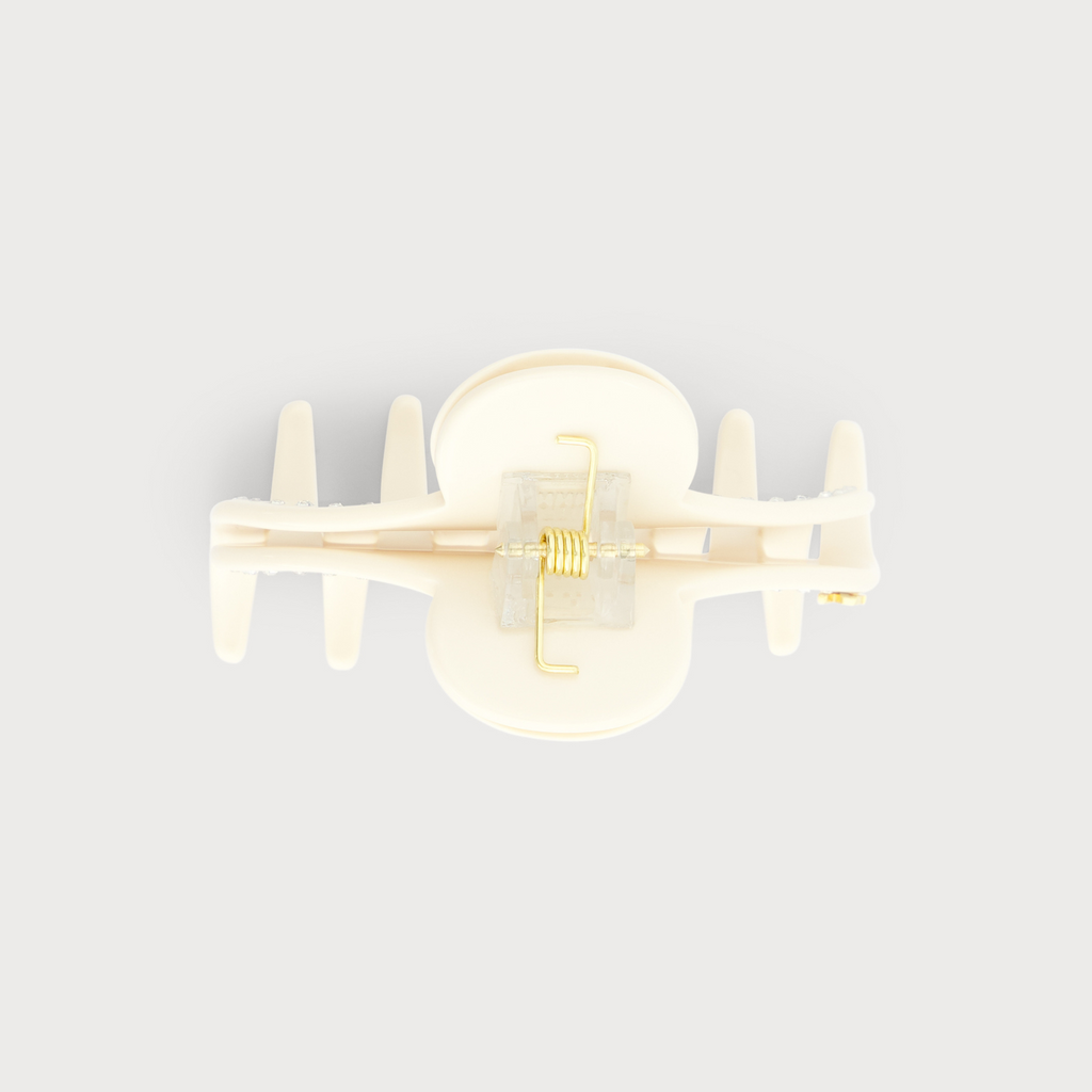 Pince S accessoire de cheveux confectionnée en France auprès d'artisans luxe finitions Knot vue de profil couleur Ivoire