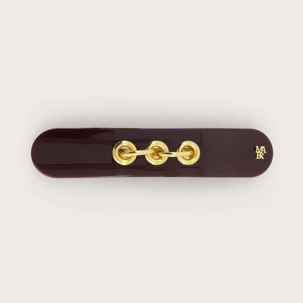 Barrette fine à cheveux confectionnée en France auprès d'artisans luxe couleur bordeaux  et dorée