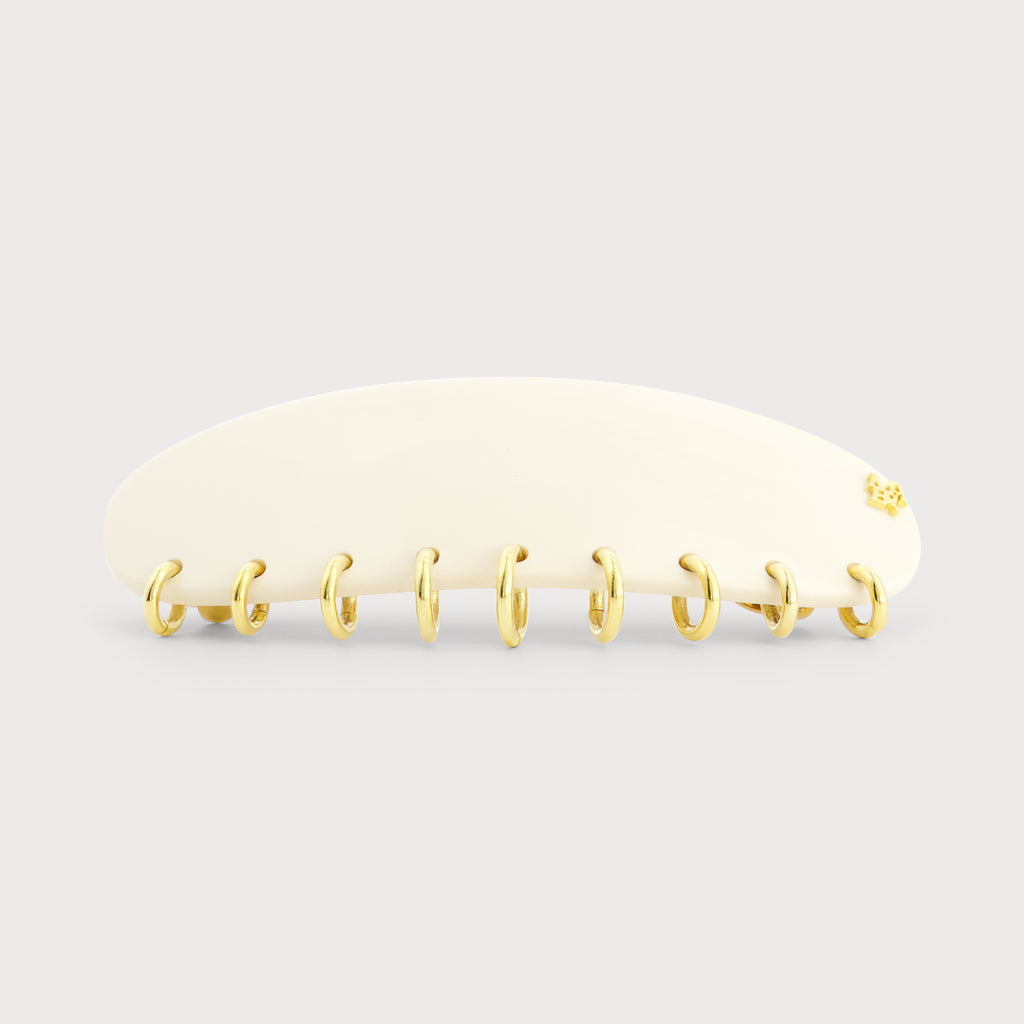 Barrette bijou à cheveux Made In France haut de gamme vue de coté finition Piercing couleur Ivoire